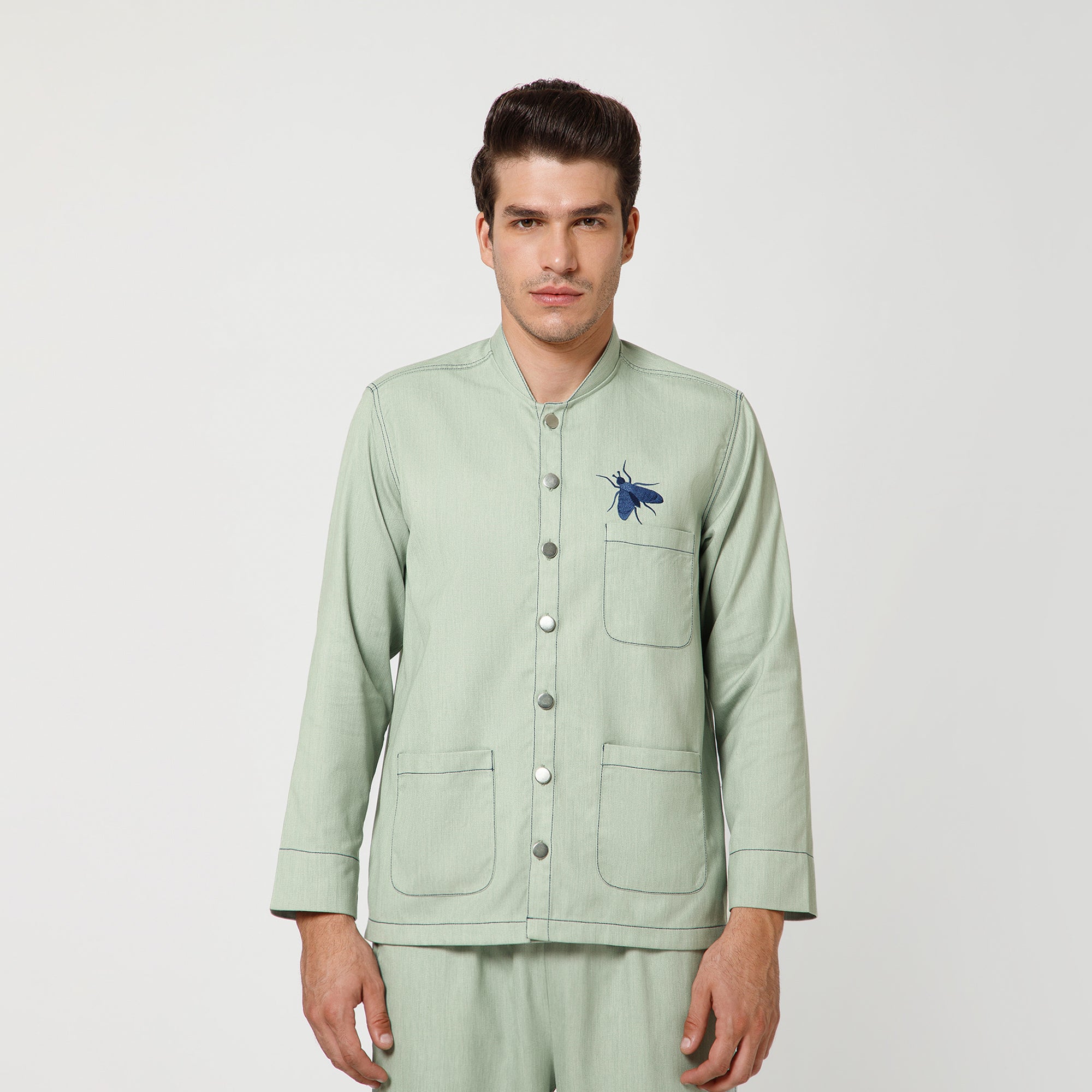 Green Denim Jacket With Blue Top Stitch And Blue Fly