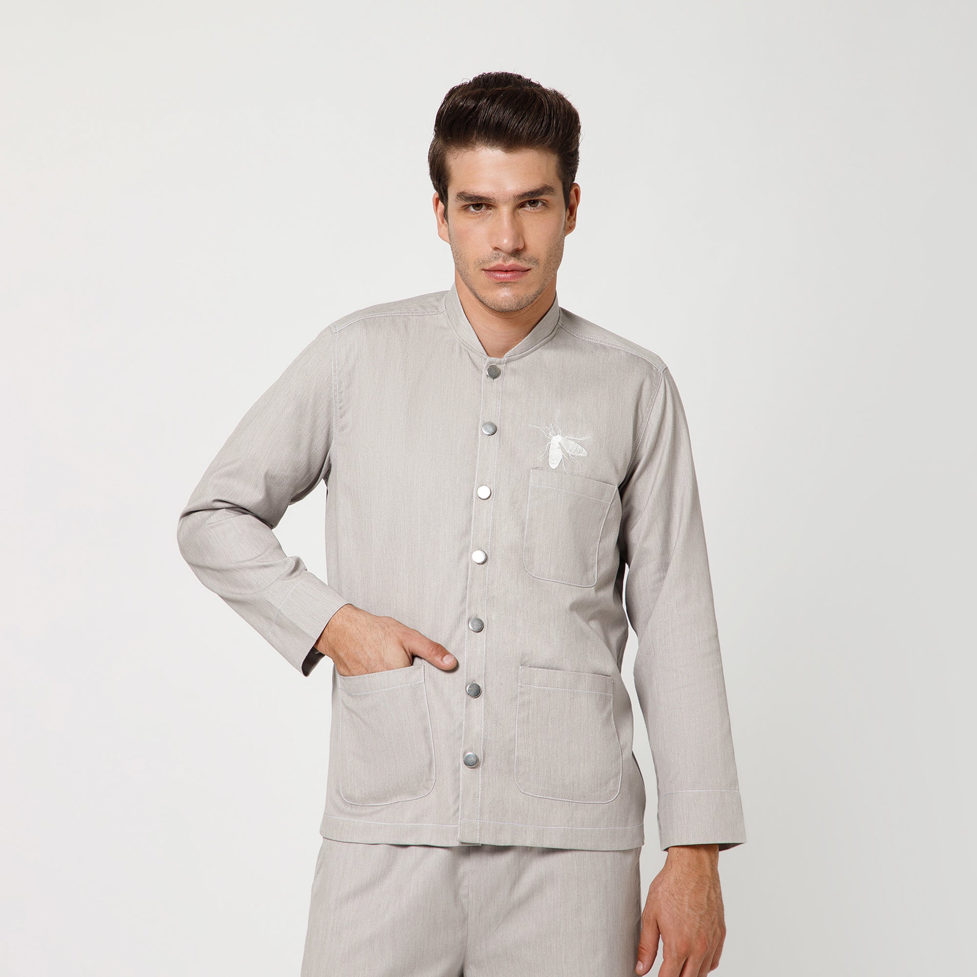Grey Denim Jacket With White Top Stitch And White Fly