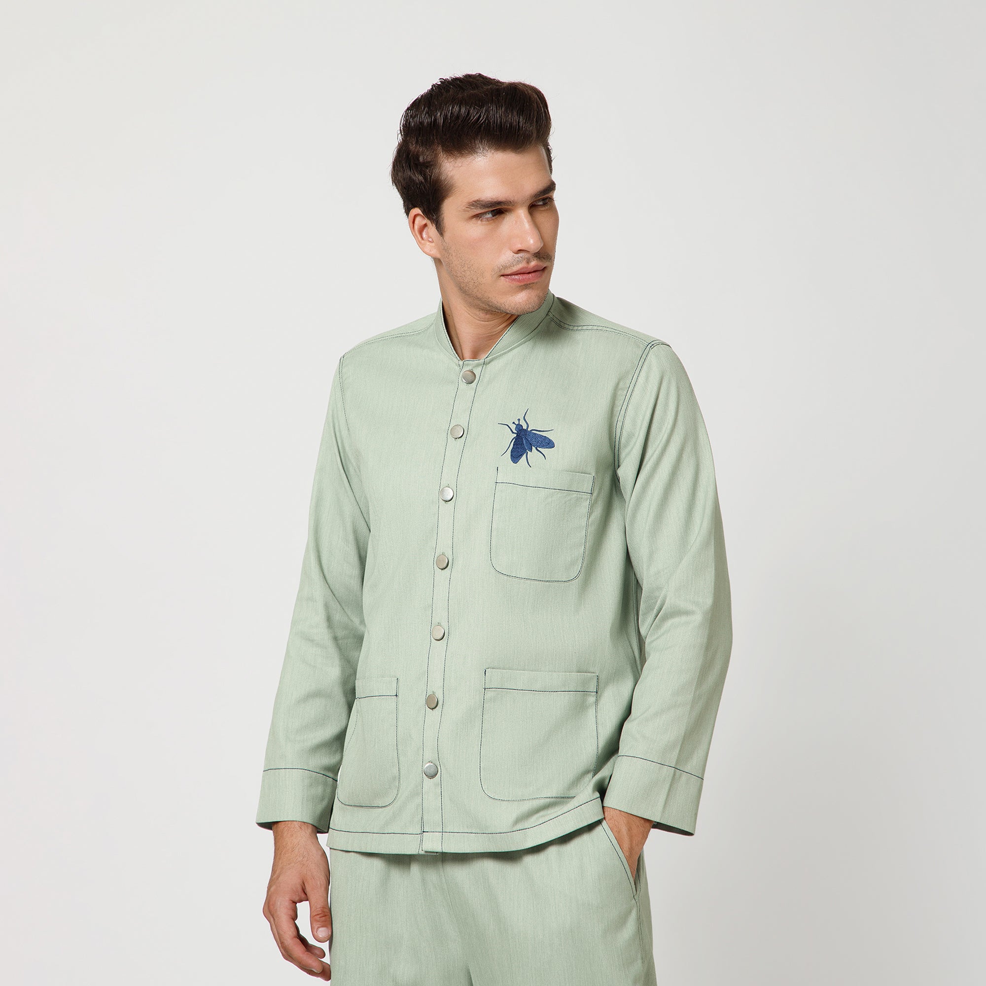 Green Denim Jacket With Blue Top Stitch And Blue Fly