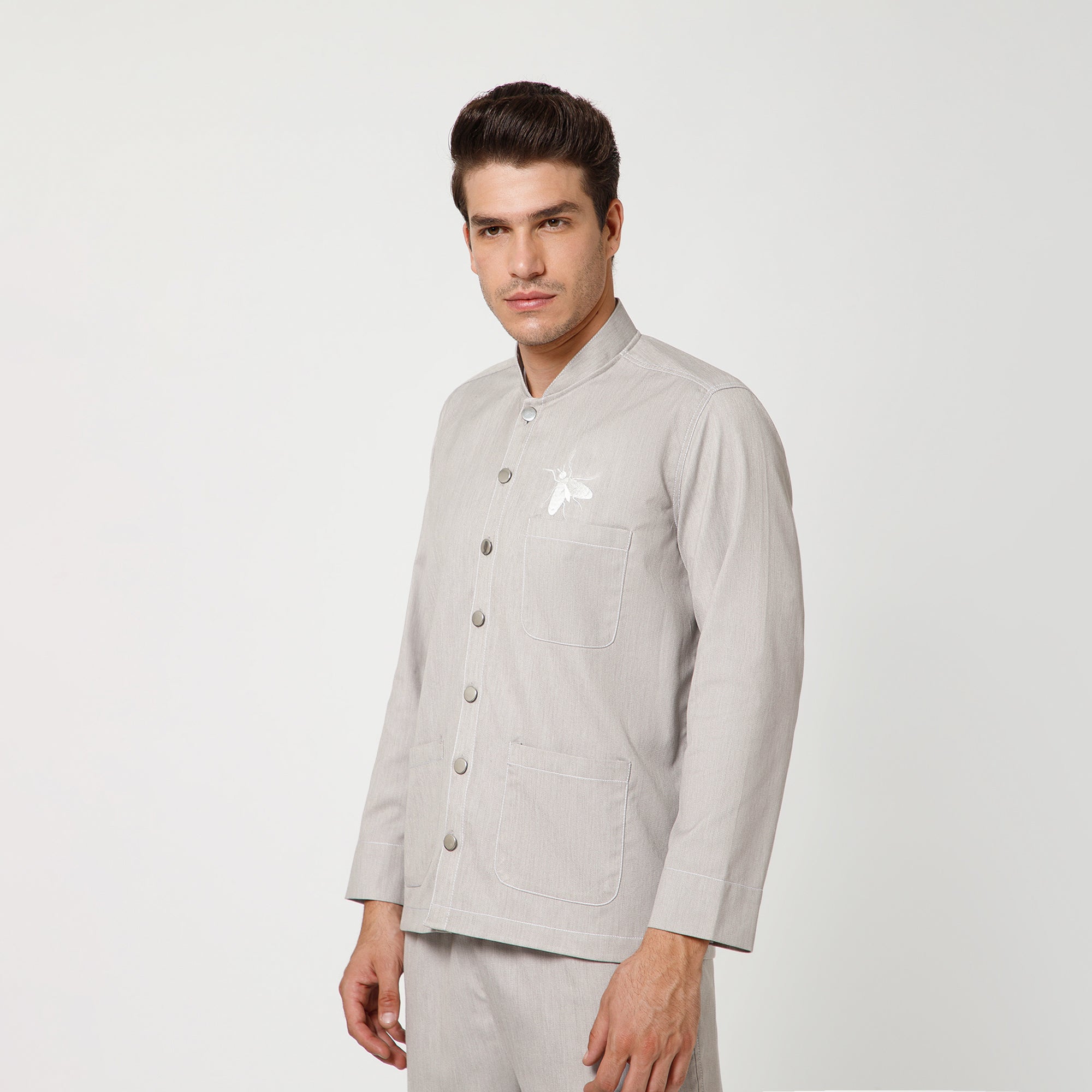 Grey Denim Jacket With White Top Stitch And White Fly