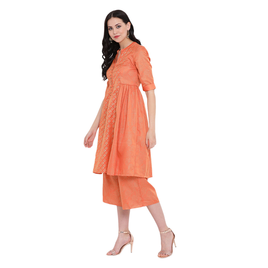 Peach tunic with gathers at side