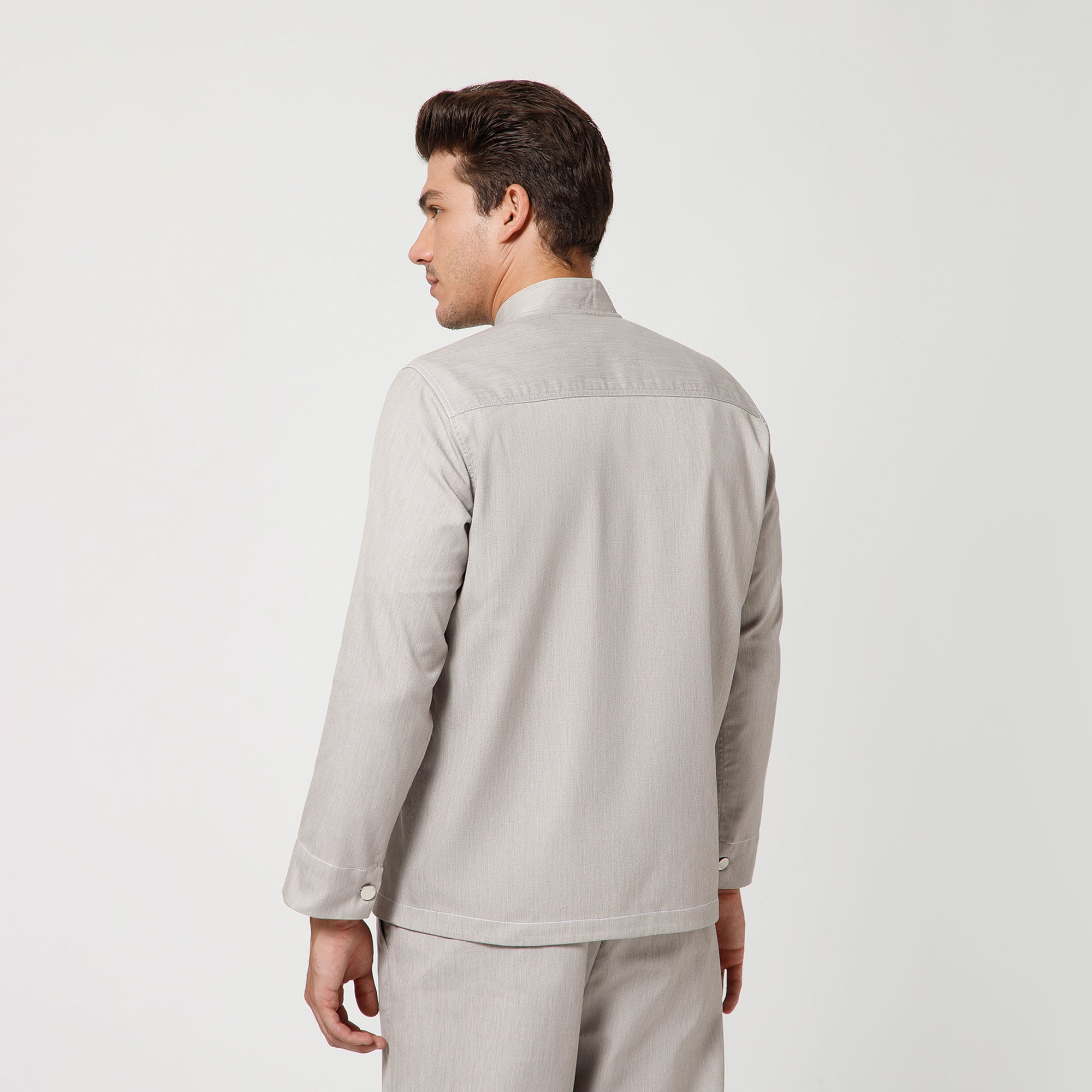 Grey Denim Jacket With White Top Stitch And White Fly