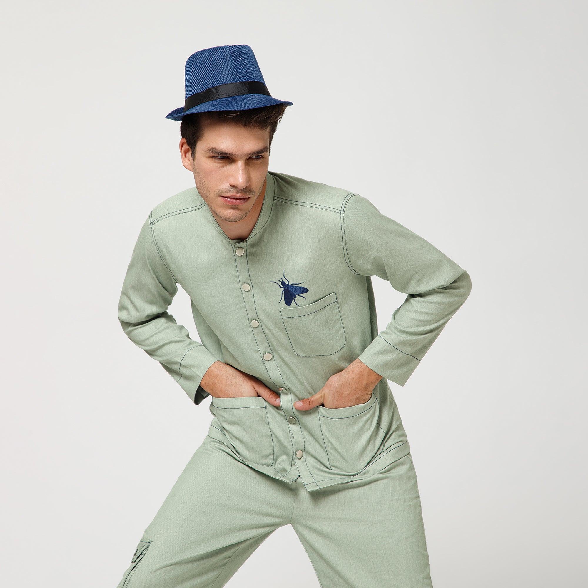 Green Denim Jacket With Blue Top Stitch And Blue Fly