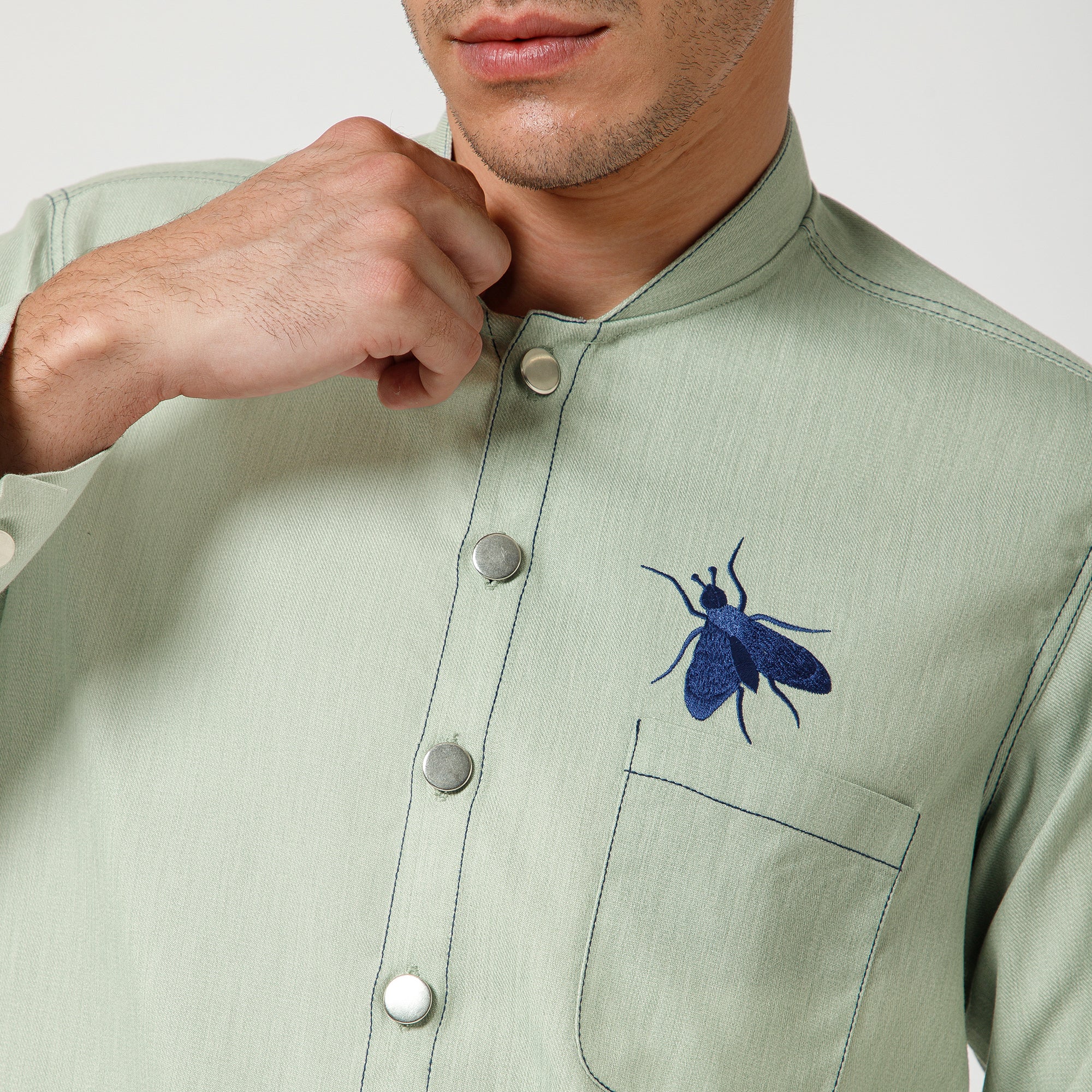 Green Denim Jacket With Blue Top Stitch And Blue Fly