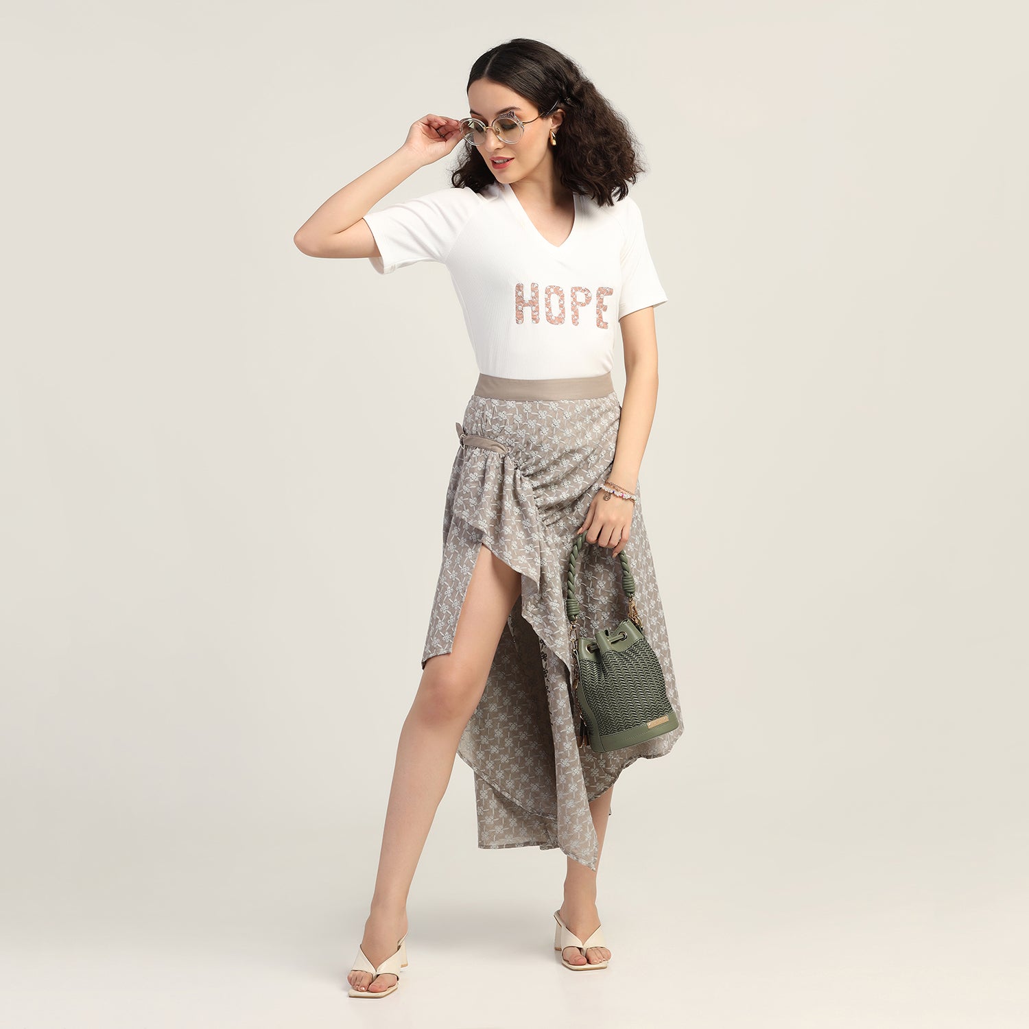 Taupe Schiffle Buckle Asymmetrical Skirt, skirts for women, long skirts for women, crop top and skirt, women in short skirts