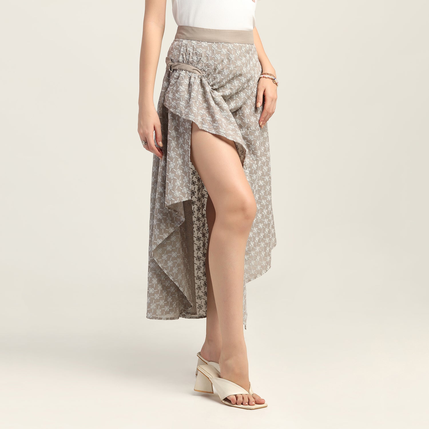 Taupe Schiffle Buckle Asymmetrical Skirt, skirts for women, long skirts for women, crop top and skirt, women in short skirts