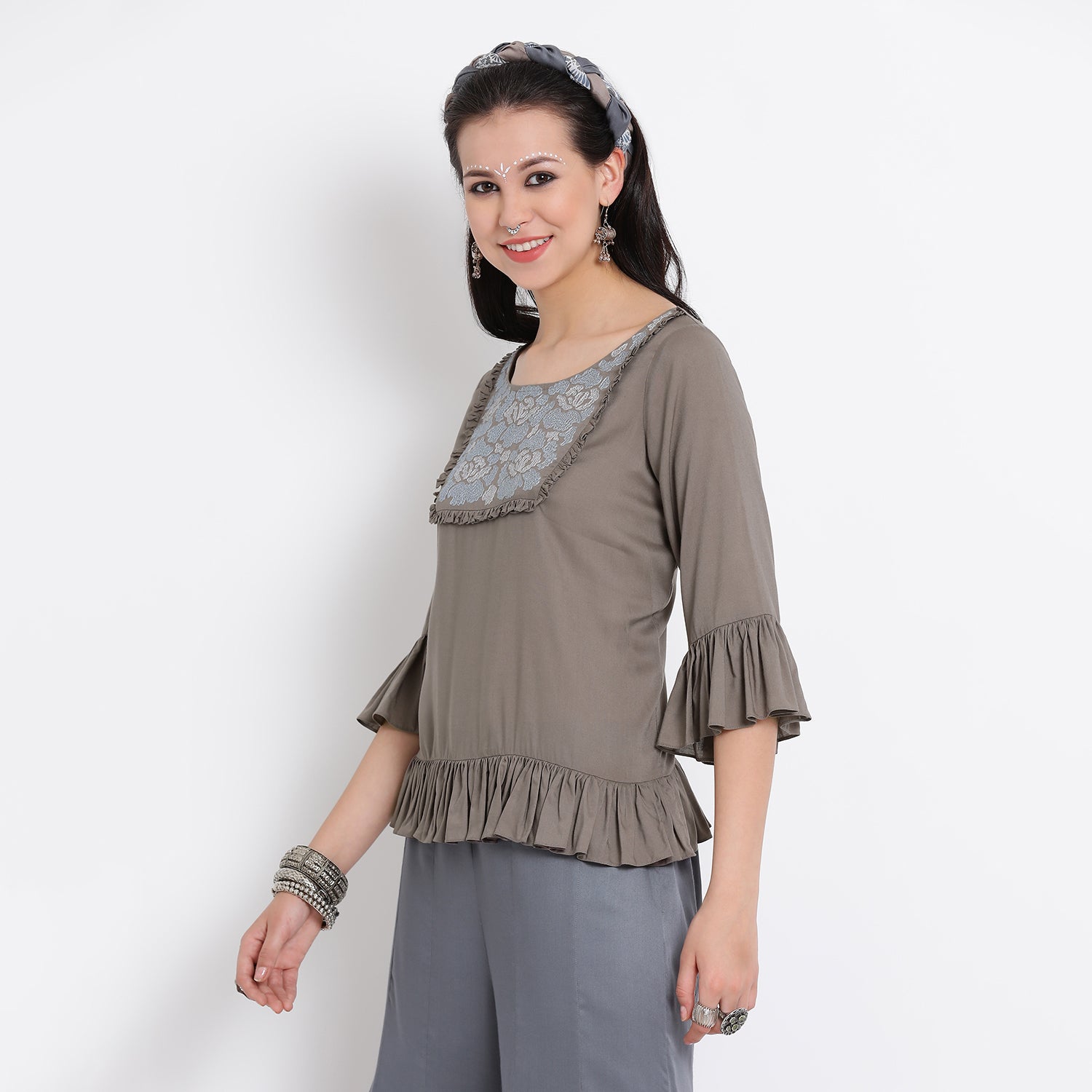 Grey viscose frill top with floral thread embroidery at yoke