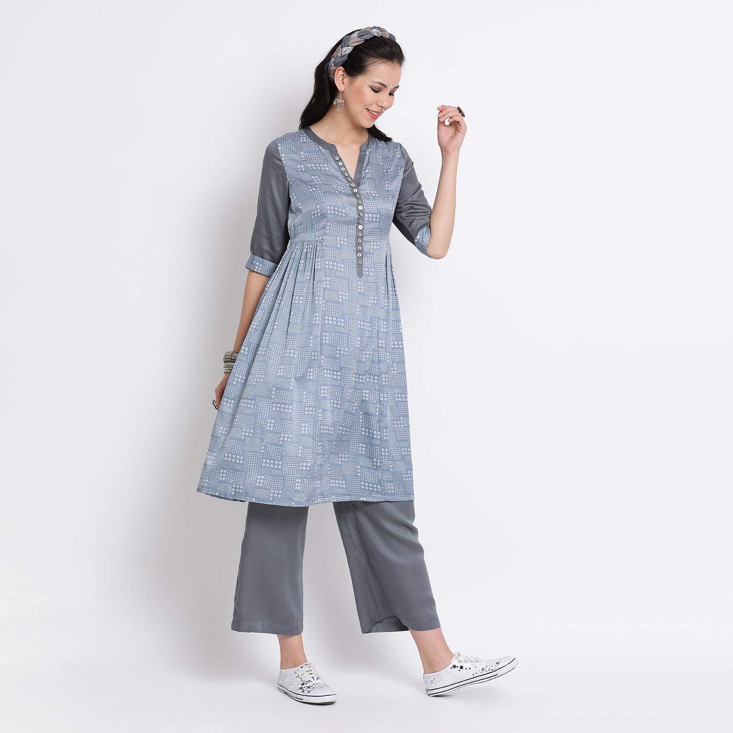 Blue polka tunic with geather at waist