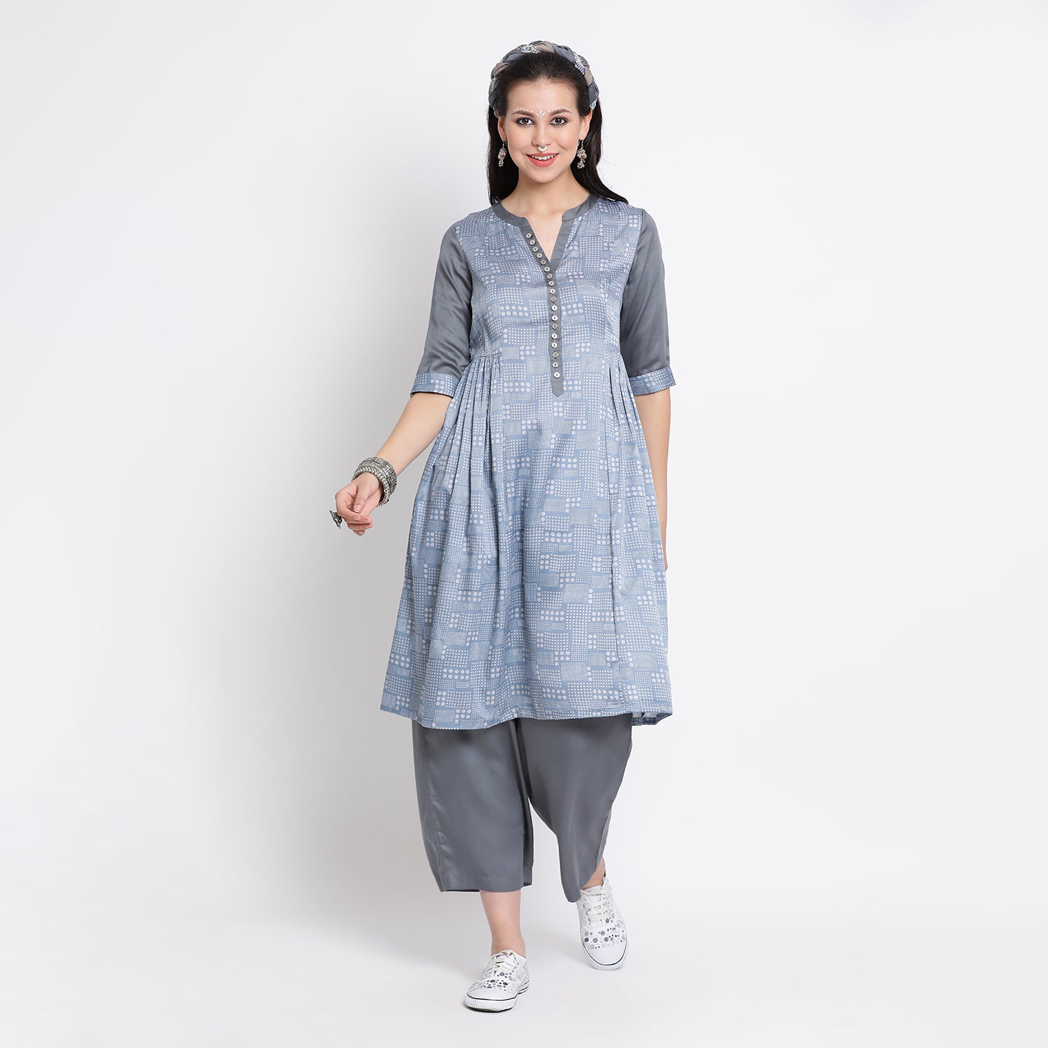 Blue polka tunic with geather at waist